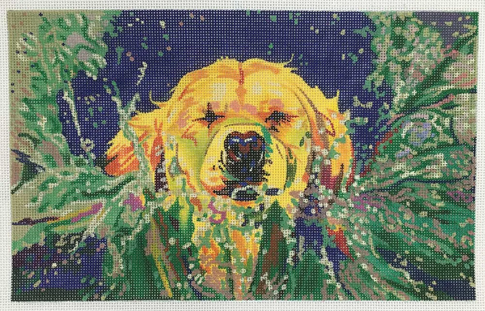 Colorful abstract needlepoint canvas of a dog's face amid green foliage on a dark blue background