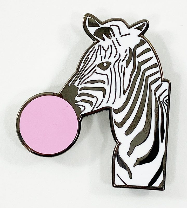 Photo depicting a zebra blowing a pink bubble.